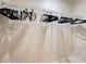 Spacious walk-in closet with ample storage space and metal hanging racks at 1531 Placida Rd # 202 Building 9, Englewood, FL 34223