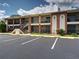 Condo building view showcasing the brick accents and private balconies at 1531 Placida Rd # 202 Building 9, Englewood, FL 34223