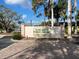 Sign for Elsie Quirk Public Library with the street address and Sarasota County logo at 1531 Placida Rd # 202 Building 9, Englewood, FL 34223