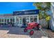 Willow Grace Mercantile with a vintage red tractor and charming storefront at 1531 Placida Rd # 202 Building 9, Englewood, FL 34223