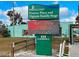 A vibrant welcome sign to Englewood near Pioneer Plaza and Dignam Gathering Stage, with street address at 1531 Placida Rd # 202 Building 9, Englewood, FL 34223