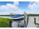 A boat on a lift on a quiet lake at 15336 Spanish Point Dr, Port Charlotte, FL 33981