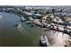 Aerial view of a marina featuring docked boats and waterfront properties at 1555 Tarpon Center Dr # G 235, Venice, FL 34285