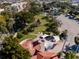 Aerial view of park with water features, shade structures, and green spaces at 1555 Tarpon Center Dr # G 235, Venice, FL 34285