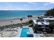 Gorgeous beachfront property featuring a sparkling pool and stunning ocean views at 1555 Tarpon Center Dr # G 235, Venice, FL 34285