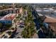 Charming street view featuring palm-lined roads and Mediterranean-style buildings at 1555 Tarpon Center Dr # G 235, Venice, FL 34285