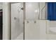 Modern bathroom with a glass-enclosed shower and tile surround at 15963 Crofton Springs Way, Port Charlotte, FL 33953
