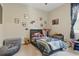 Spacious bedroom with fun decor, natural light, and carpet at 15963 Crofton Springs Way, Port Charlotte, FL 33953