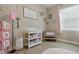 Bright and airy Bedroom with crib, changing table, and natural light at 15963 Crofton Springs Way, Port Charlotte, FL 33953