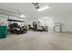 Spacious garage features storage, golf cart, and plenty of room at 15963 Crofton Springs Way, Port Charlotte, FL 33953