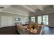 Comfortable community lounge with ample seating and a television at 15963 Crofton Springs Way, Port Charlotte, FL 33953