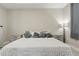 Well-lit main bedroom featuring neutral tones and a calming atmosphere at 15963 Crofton Springs Way, Port Charlotte, FL 33953