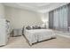 Spacious main bedroom with neutral décor, tray ceiling, and plush carpeting for a relaxing retreat at 15963 Crofton Springs Way, Port Charlotte, FL 33953