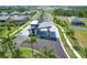 Aerial view of a community entrance featuring a modern entry gate at 17595 Opal Sand Dr # 205, Venice, FL 34293