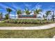 Well-maintained Wellen Park Golf & Country Club sign surrounded by lush greenery at 17595 Opal Sand Dr # 205, Venice, FL 34293