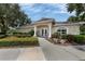 Inviting clubhouse exterior with well-maintained landscaping at 188 Grand Oak Cir, Venice, FL 34292