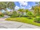 Charming single-story home with a well-manicured lawn, mature landscaping and tile roof at 188 Grand Oak Cir, Venice, FL 34292