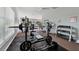 Community gym with various machines and free weights at 188 Grand Oak Cir, Venice, FL 34292