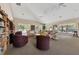 Spacious living room with comfortable seating and lots of light at 188 Grand Oak Cir, Venice, FL 34292
