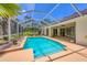 Screened-in pool and patio area for outdoor enjoyment at 188 Grand Oak Cir, Venice, FL 34292