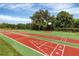 Sports court with shuffleboard and basketball, perfect for active lifestyles at 188 Grand Oak Cir, Venice, FL 34292