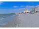 Scenic beach with sunbathers, seagulls, and tranquil ocean views at 200 The Esplanade N # C19, Venice, FL 34285