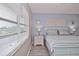 Serene bedroom bathed in natural light, creating a peaceful retreat at 200 The Esplanade N # C19, Venice, FL 34285