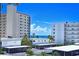 Ocean view condos with carports and clear blue skies at 200 The Esplanade N # C19, Venice, FL 34285