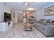 Cozy living room boasts modern decor and comfortable seating, creating an inviting space at 200 The Esplanade N # C19, Venice, FL 34285