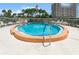 Inviting spa pool surrounded by lounge chairs, perfect for relaxation and enjoying the outdoors at 200 The Esplanade N # C19, Venice, FL 34285
