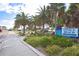 Venice Beach sign amidst lush greenery along a sidewalk at 200 The Esplanade N # C19, Venice, FL 34285