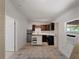 Bright kitchen features stainless steel appliances, an island and tile floors at 2008 55Th E Ave, Bradenton, FL 34203