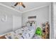 Comfortable ' bedroom featuring a cozy bed, neutral walls and decor, and ample space at 20235 Granlago Dr, Venice, FL 34293