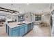 Open kitchen and dinette with large island and stainless steel appliances at 20235 Granlago Dr, Venice, FL 34293