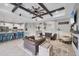 Open floor plan featuring a modern living room and island with seating at 20235 Granlago Dr, Venice, FL 34293