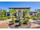 Community clubhouse featuring an arched entrance and center water fountain at 213 Malina Ct, Nokomis, FL 34275