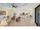 The bright kitchen has stainless steel appliances, stone countertops, and a central island at 213 Malina Ct, Nokomis, FL 34275