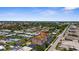 Enjoy breathtaking aerial view of condo community, lush landscapes, and Gulf views at 235 Base E Ave # 207, Venice, FL 34285