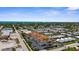 Captivating aerial view of condo community surrounded by greenery and Gulf at 235 Base E Ave # 207, Venice, FL 34285