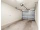 Clean and spacious garage with painted walls and high ceilings at 235 Base E Ave # 207, Venice, FL 34285