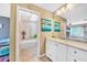 This bathroom has dual sinks and a separate shower and tub at 249 Hallcrest Ter, Port Charlotte, FL 33954