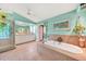 Bright bathroom features a soaking tub, separate shower, and dual sinks at 249 Hallcrest Ter, Port Charlotte, FL 33954