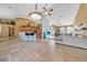 Spacious open concept living room boasts tile floors, a wet bar, and plenty of natural light at 249 Hallcrest Ter, Port Charlotte, FL 33954