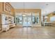 Open living room with natural light, tiled floors, and views of the pool at 249 Hallcrest Ter, Port Charlotte, FL 33954