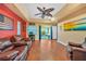 The living room has hardwood floors and ample seating at 249 Hallcrest Ter, Port Charlotte, FL 33954
