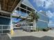 Outdoor commercial area with shops, restaurants, and pedestrian walkways for leisurely exploration at 25050 Sandhill Blvd # 6A3, Punta Gorda, FL 33983