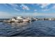 Marina view featuring docked sailboats, powerboats, and blue water at 25050 Sandhill Blvd # 6A3, Punta Gorda, FL 33983