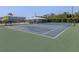 View of the community tennis courts, perfect for friendly matches and active living at 25050 Sandhill Blvd # 6A3, Punta Gorda, FL 33983