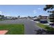 View of the community's parking lot and boat storage area, with boats, cars, and mobile homes at 310 Tropic Dr, Osprey, FL 34229