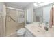 Nicely appointed bathroom offering a walk-in shower and modern vanity with great natural light at 349 Mariner Dr, North Port, FL 34287